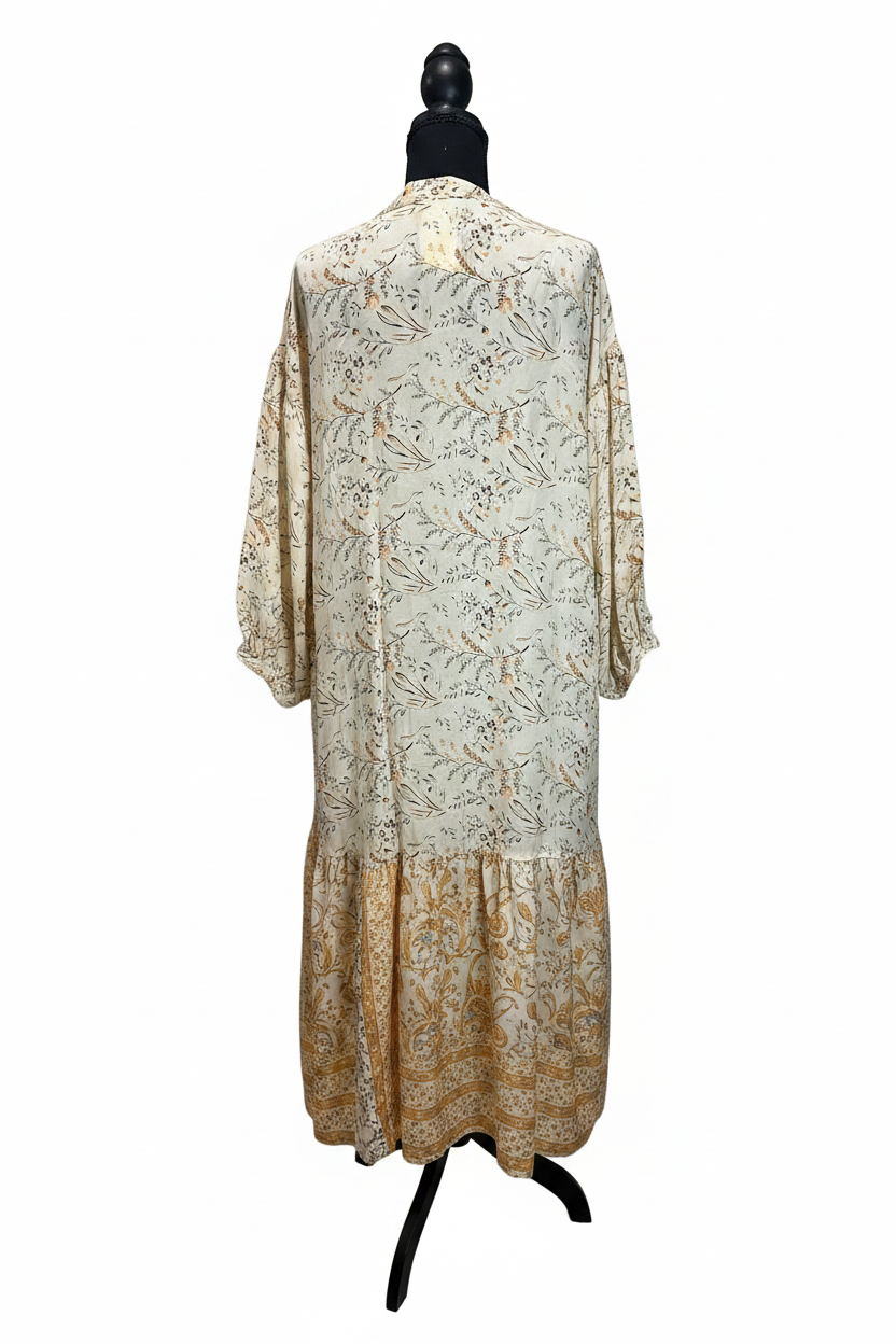 Vestido crema floral espalda